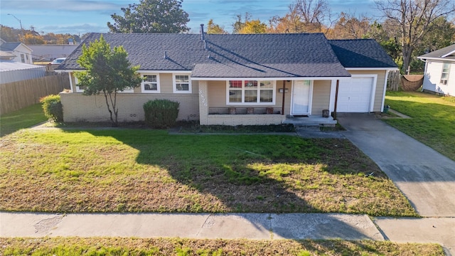 ranch-style house with a front lawn and a garage