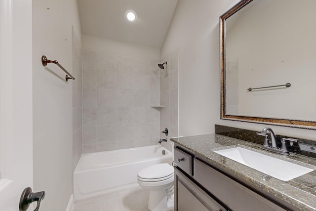 full bathroom with vanity, tiled shower / bath, tile patterned floors, and toilet