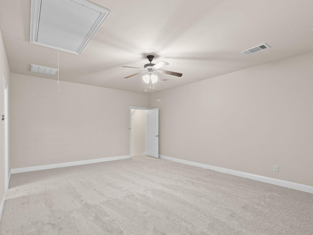 carpeted empty room featuring ceiling fan