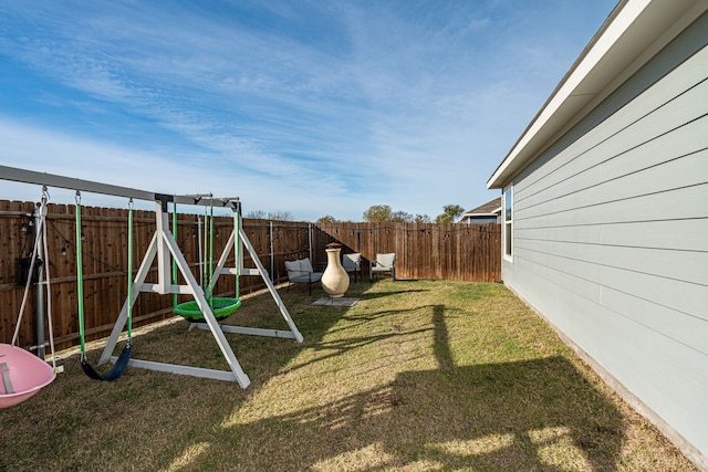 view of yard with a playground