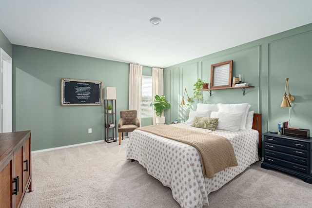 bedroom with light colored carpet