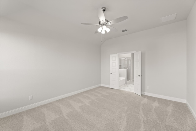 unfurnished bedroom with carpet, visible vents, baseboards, and ensuite bath