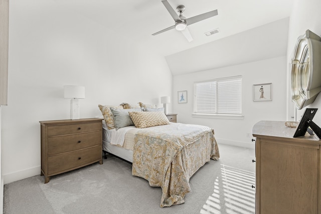 bedroom featuring ceiling fan, light colored carpet, and lofted ceiling