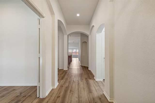 corridor featuring light hardwood / wood-style flooring