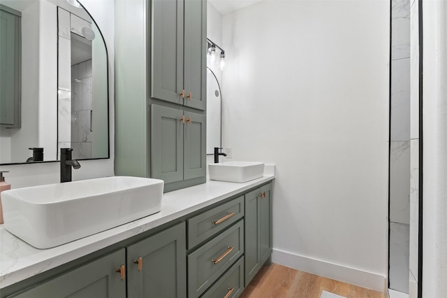 bathroom featuring vanity and hardwood / wood-style flooring