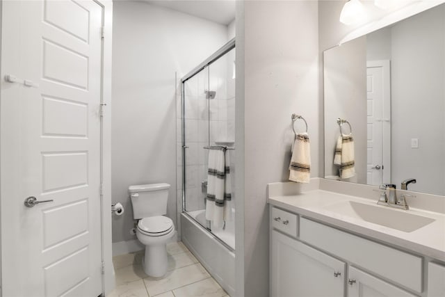 full bathroom featuring toilet, vanity, and bath / shower combo with glass door