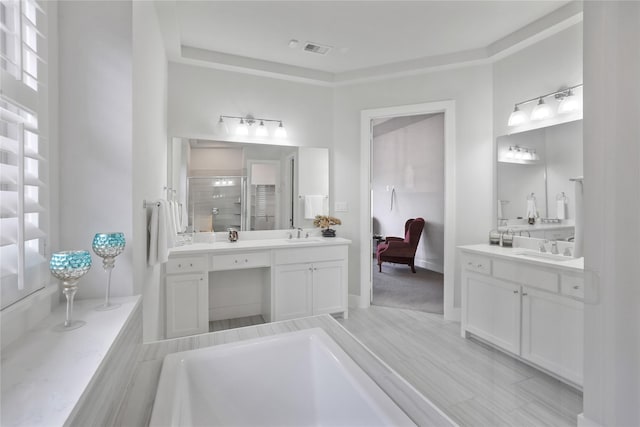 bathroom with vanity and an enclosed shower