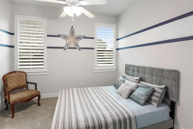 bedroom with light carpet and ceiling fan