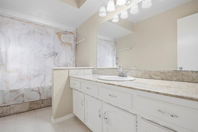 bathroom featuring tile patterned floors and vanity