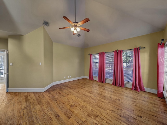 unfurnished room featuring ceiling fan, high vaulted ceiling, and light hardwood / wood-style flooring