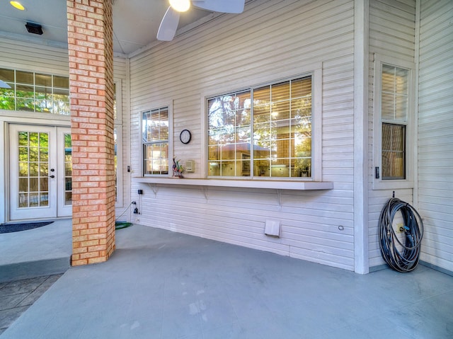 view of patio featuring ceiling fan