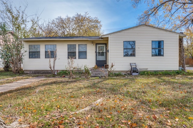 single story home with a front yard