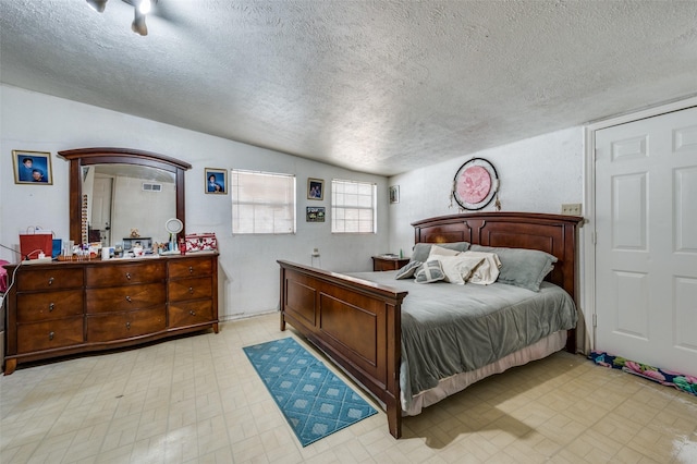 bedroom with a textured ceiling