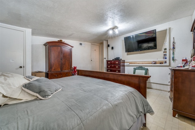 bedroom with a textured ceiling