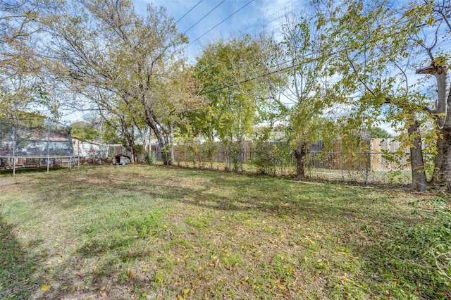 view of yard featuring a trampoline