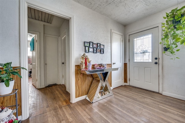 entrance foyer with light hardwood / wood-style floors