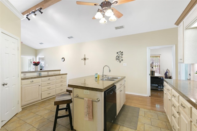 kitchen with sink, black dishwasher, a kitchen breakfast bar, a center island with sink, and light wood-type flooring