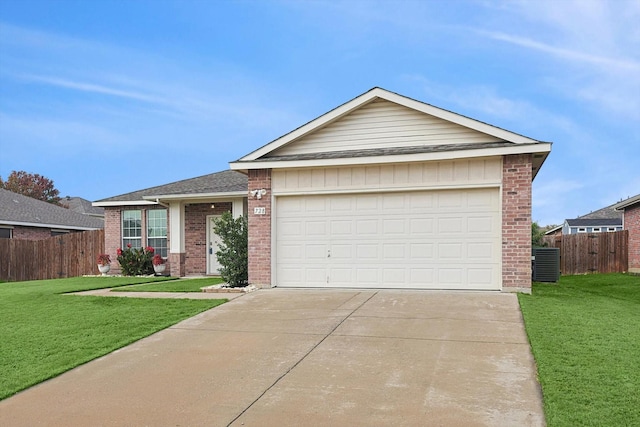 ranch-style home with a front yard, central AC, and a garage