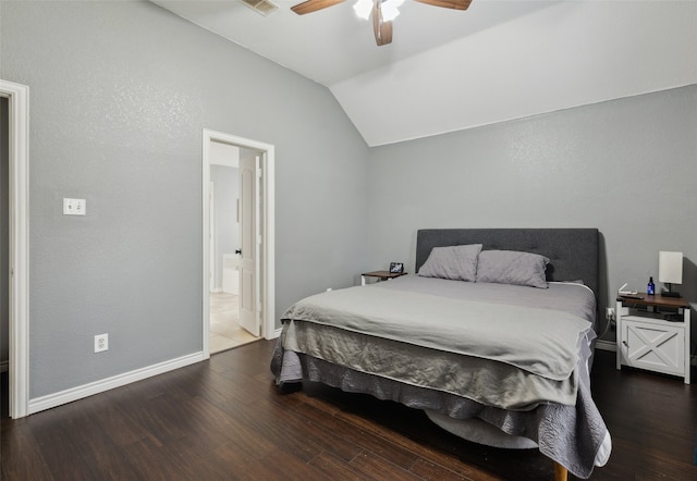 bedroom with ceiling fan, hardwood / wood-style floors, ensuite bathroom, and vaulted ceiling