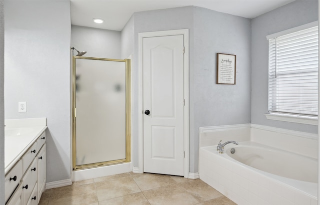 bathroom featuring tile patterned flooring, vanity, and independent shower and bath