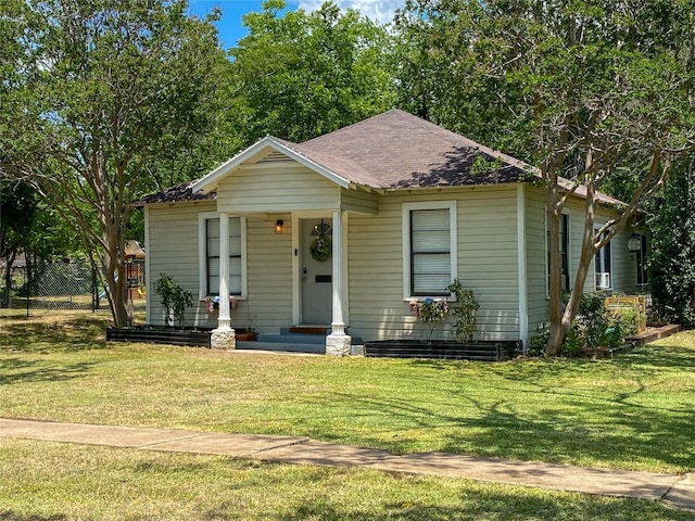 bungalow with a front yard