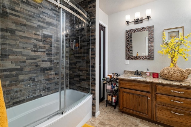 bathroom featuring vanity and enclosed tub / shower combo