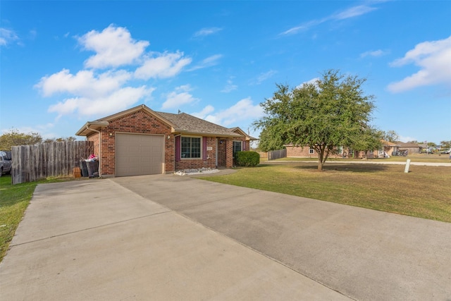 ranch-style house featuring a garage and a front yard