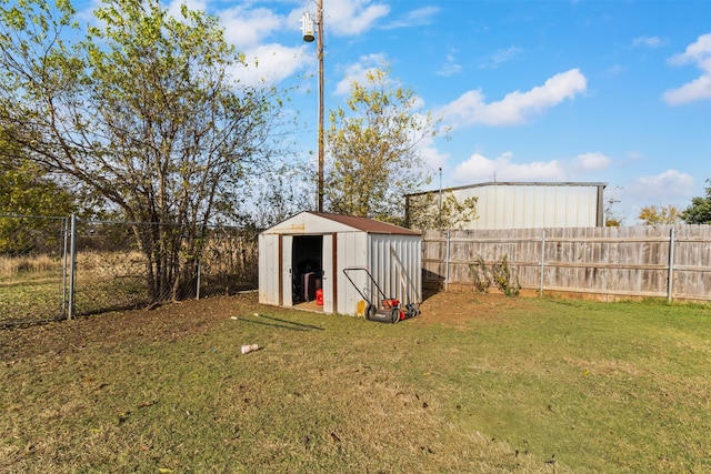 view of outdoor structure with a lawn