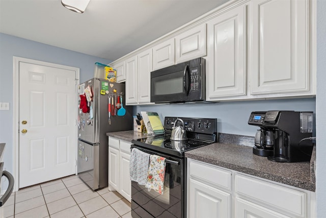 kitchen featuring light tile patterned flooring, white cabinets, and black appliances