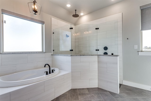 bathroom featuring plus walk in shower