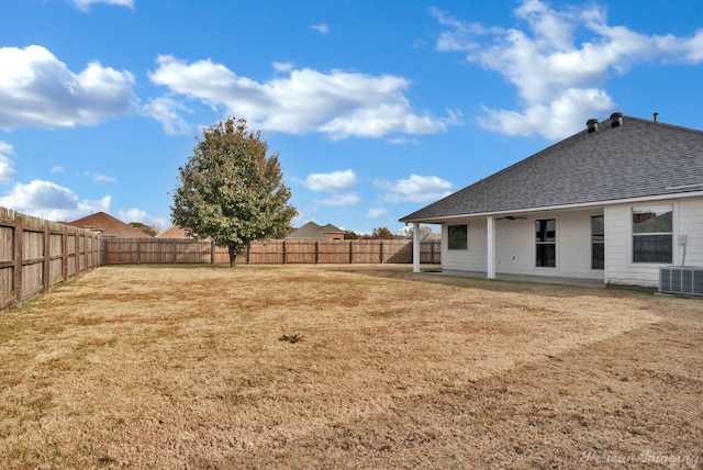 view of yard featuring central AC