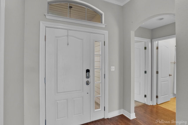 entryway with hardwood / wood-style floors