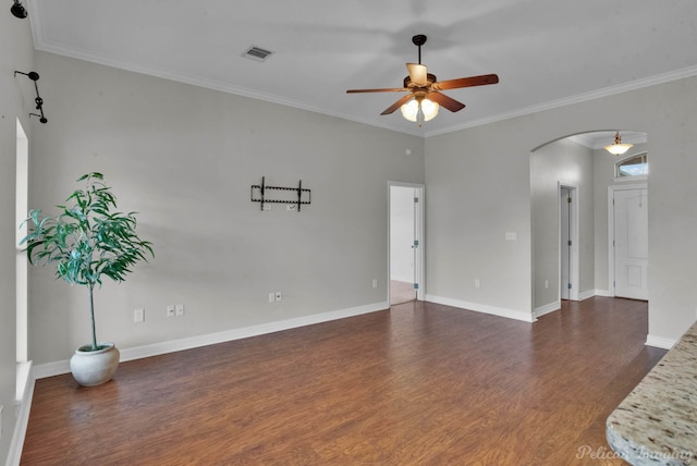 empty room with dark wood-type flooring, ceiling fan, and ornamental molding