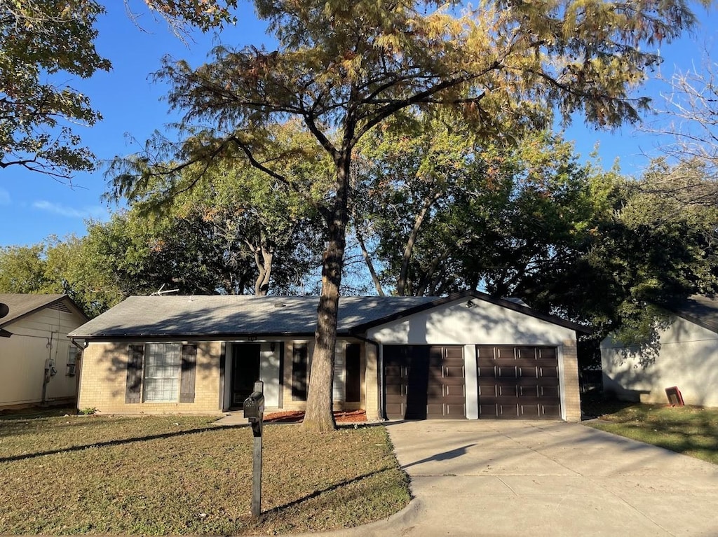 single story home with a garage