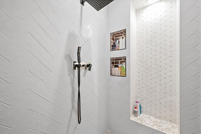 interior space with a tile shower