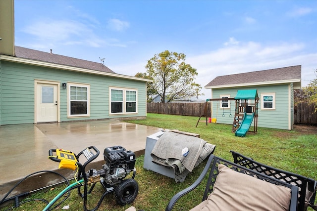 exterior space with a playground and a patio area