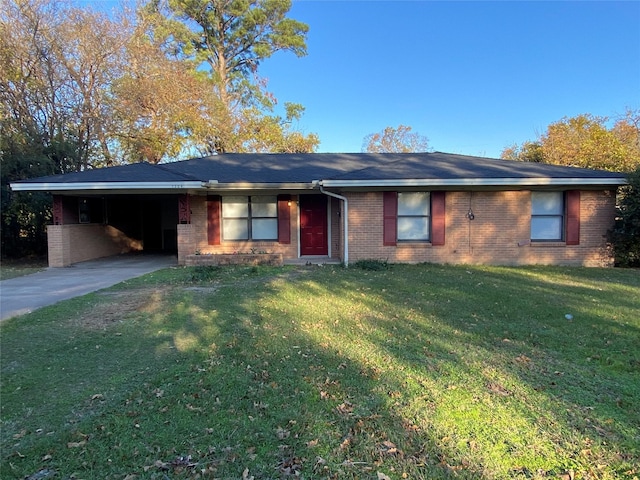 ranch-style house with a front lawn and a carport