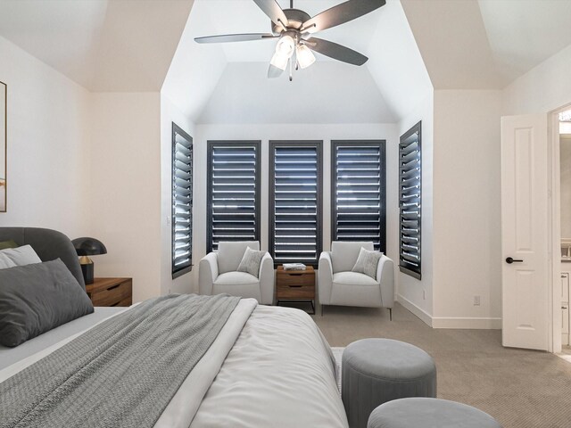 bathroom featuring vanity, a tub to relax in, and ceiling fan