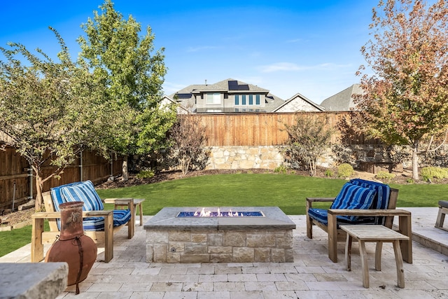 view of patio / terrace with a fire pit