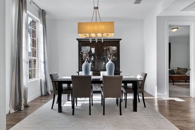 dining room with light wood-type flooring