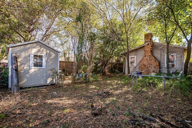 view of yard with a storage shed