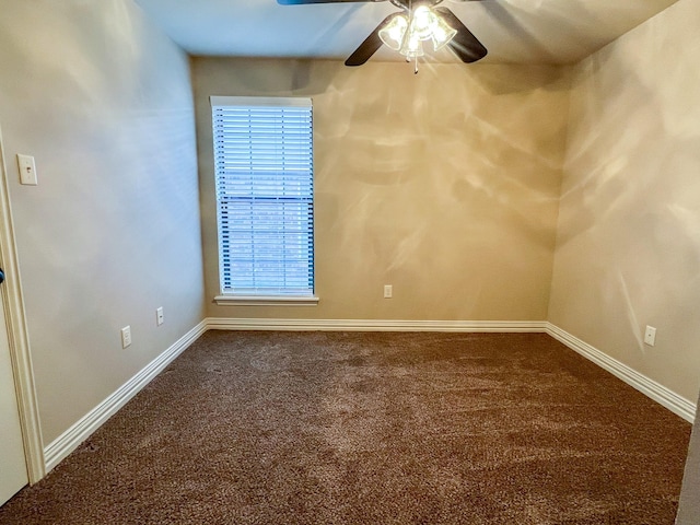 carpeted empty room with ceiling fan