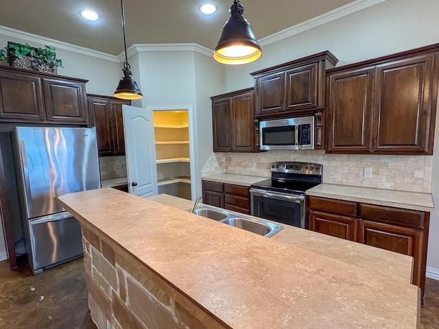 kitchen featuring dark brown cabinetry, sink, stainless steel appliances, crown molding, and decorative light fixtures