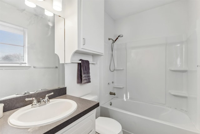 full bathroom featuring vanity, toilet, and shower / bath combination