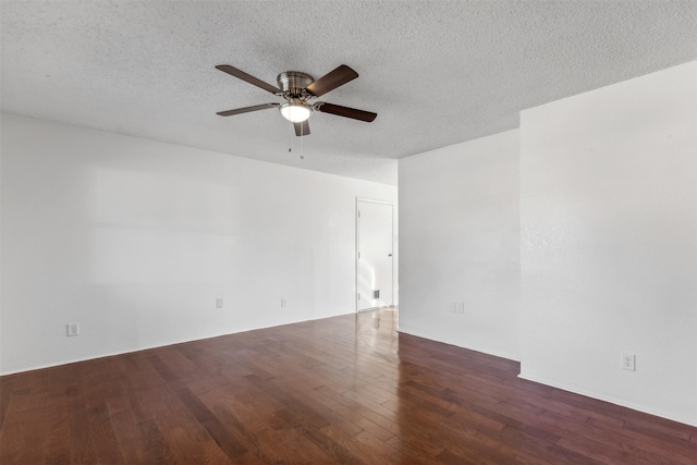 unfurnished room featuring a textured ceiling, ceiling fan, and dark hardwood / wood-style floors