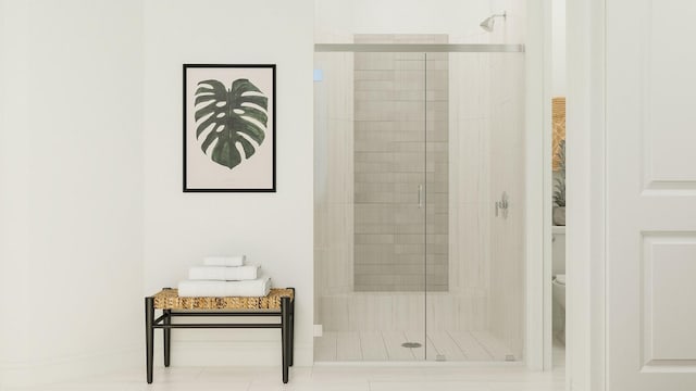 bathroom with tile patterned flooring, toilet, and a shower with door