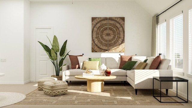 living area featuring vaulted ceiling