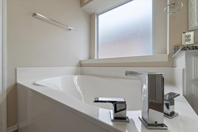 bathroom featuring a bathtub