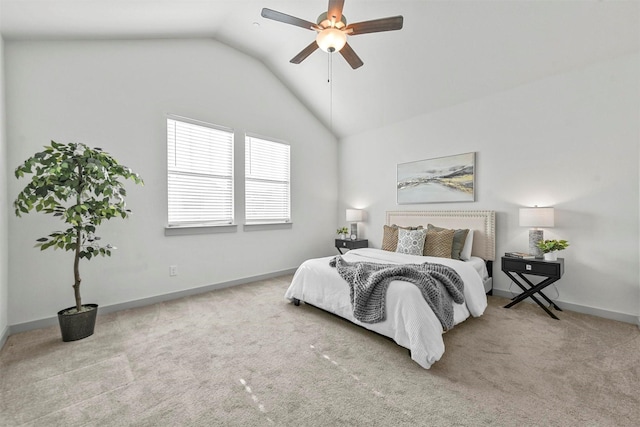 bedroom featuring light carpet, vaulted ceiling, and ceiling fan