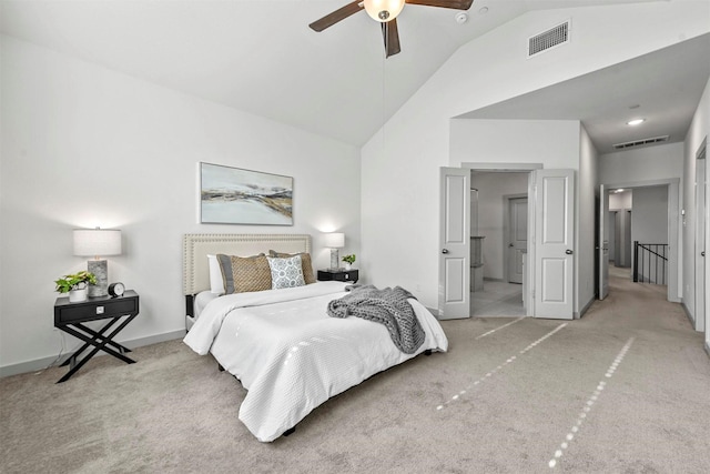 bedroom featuring ceiling fan, carpet, and high vaulted ceiling